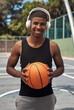 © peopleimages.com - Basketball portrait, player and man with headphones on court for practice break, workout music or fitness training. African person, sports athlete and radio for game performance and match exercise