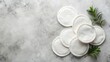© lapeepon - Gentle cleaning with reusable cotton pads on a concrete surface , natural beauty, eco friendly