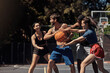 © peopleimages.com - People, basketball and defense exercise on court, community and outdoor competition with friends. Sports, games and match for fitness at recreation centre, diversity and friendly tournament practice