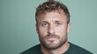 © MAKASIHMAS SIDNEY - Serious man portrait against muted green background