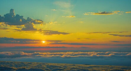 Aufkleber - Sunset over a sea of clouds with vibrant orange and blue sky during golden hour in a mountainous landscape