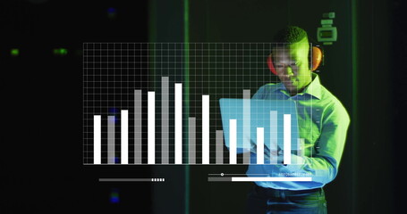 Wall Mural - Image of digital data processing over afrcian american it man with laptop by computer servers