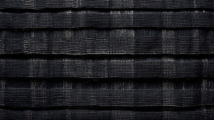 Poster - Textured black tweed fabric closeup showcasing woven patterns and intricate details ideal for design and textile backgrounds.