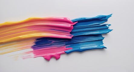 Wall Mural - colorful brush strokes in vibrant pink, blue, and yellow on a white background showcasing artistic t