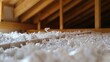 © Pannee - Cellulose insulation material blown into wall cavities for even coverage