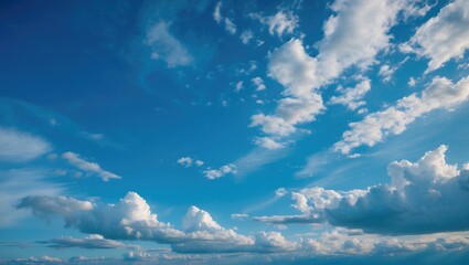 Wall Mural - blue sky with fluffy clouds scattered throughout, illustrating a clear and open atmosphere, ideal fo