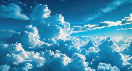 Wall Mural - dramatic cloud formations in a bright blue sky illuminated by soft sunlight creating a vibrant atmos