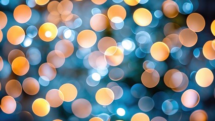 Wall Mural - Colorful bokeh background with circular light spots in warm tones of orange and cool tones of blue creating a festive atmosphere