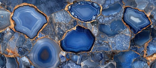 Leinwandbilder - Blue agate stone surface with intricate patterns, featuring shades of deep blue, light blue, and gold accents surrounding the stones.