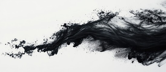 Aufkleber - Black activated charcoal spread dynamically across a clean white background showcasing intricate textures and fluid movement in the composition.
