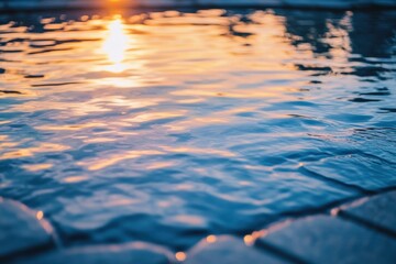 Fototapete - Rippling water reflects the warm glow of a sunset over a tranquil swimming pool. Generative AI