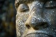 © Alena - A detailed view of a statue's facial features, great for illustration or conceptual use