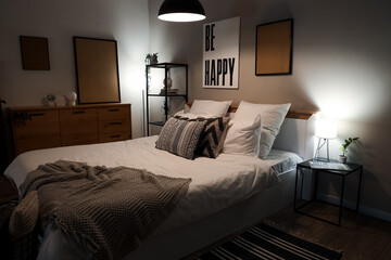 Wall Mural - Stylish interior of bedroom late in evening