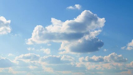 Wall Mural - beautiful blue sky with soft white clouds timelapse for abstract background