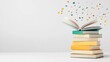 © Fluke - Colorful Confetti Surrounds Open Book on Stack of Books