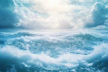 Wall Mural - Waves crash against the shore under a bright sky filled with fluffy clouds