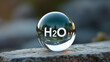 © Colorful Pixels - Resting on a textured stone surface, a crystal-clear sphere with 'H₂O' represents clean water, purity, and eco conscious living, emphasizing the importance of sustainability and hydration.