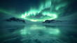 © ภูริพัฒน์ ภิรมย์กิจ - Aurora Borealis Over Frozen Landscape: The sky ablaze with the mesmerizing dance of the Northern Lights illuminates a serene, frozen landscape, mirroring in the icy waters below.