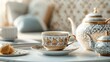© Premium_art - Elegant teacup and teapot set on a marble table.  A tranquil scene.