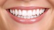 © olga_demina - Capturing a close up of a perfect smile, showcasing healthy white teeth and pink lips, highlighting the importance of oral hygiene, cosmetology, and dentistry