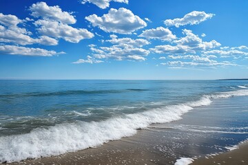Fototapete - Calm waves lapping at the shore under a bright blue sky with scattered clouds in the late afternoon. Generative AI