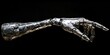 © HappyPic - Silver hand with a black background