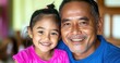 © David Giraud - Portrait d'un père de famille et de sa fille, hispaniques, heureux ensemble, souriant et complice.