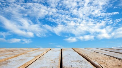 Fototapete - Vast open space with wooden planks under a bright blue sky adorned with fluffy clouds : Generative AI