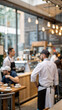 © Maxim - Blurred coffee shop or cafe restaurant. Blurred restaurant background with some people and chefs and waiters working.