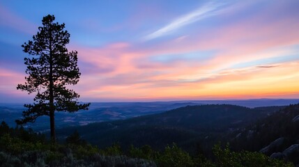 Fototapete - Stunning sunset over rolling hills and a single tree creating a picturesque evening landscape filled with vivid colors : Generative AI