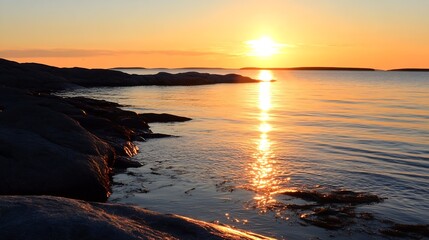 Aufkleber - Golden sunrise over calm waters with reflections on the rocks creating a tranquil scene : Generative AI