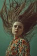 © Валентина Евдокимова - Vibrant portrait of a woman with big flowing hair, showcasing unique style and artistic expression against a serene backdrop