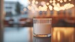 © Nathan - Glass of Milk on Table in Warmly Lit Restaurant Setting
