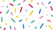 © Almultazam - Scattered colorful sprinkles against a pristine white background are visible