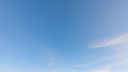 Wall Mural - time-lapse blue sky, cloudscape background. white wispy clouds in a clear air environment. wide-angl