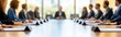 © da - Wooden meeting table with contracts, pens, and coffee, creating a formal signing atmosphere with a blurred business background. Perfect for showcasing business meetings, professionalism
