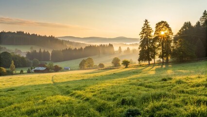 Wall Mural - A serene landscape at sunrise, featuring lush green fields, dense forests, and soft mist rolling over rolling hills, creating a tranquil atmosphere.