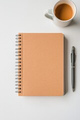 Leinwandbilder - Modern Minimalist Workspace Spiral Notebook with Daily Planner on Wooden Desk - Enhancing Office Productivity and Time Management for Business Professionals