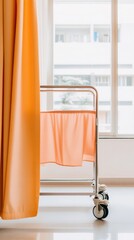 Aufkleber - Minimalist Medical Supply Cart Sleek Metal Frame with Bright Orange Curtain - Modern Healthcare Setup for Efficient Hospital Content and Emergency Response Visuals