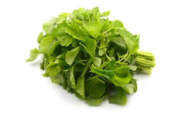 bunch of fresh tropical spinach isolated over white background, suitable for food-related content