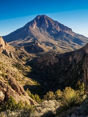 Wall Mural - Majestic mountain landscape with clear blue sky and rocky terrain showcasing natural beauty : Generative AI