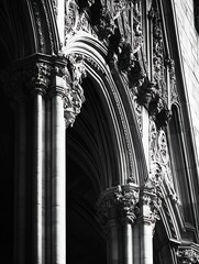 Poster - Intricate architectural details of historic gothic structure showcasing columns and carvings : Generative AI
