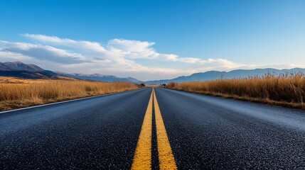 Aufkleber - Straight Road Stretching Through a Beautiful Landscape with Mountains and Blue Sky : Generative AI