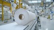© Ratchadaporn - Time lapse footage of a continuous paper roll being fed into a machine and gradually shrinking in size as it moves through the automated production line in a modern industrial factory setting