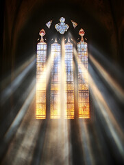 Fototapete - Sunlight Streaming Through Stained Glass in Darkened Cathedral : Generative AI
