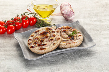 Wall Mural - Grilled natural spiral meat sausage