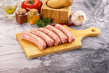 Wall Mural - Raw meat sausages for grill