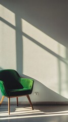 Canvas Print - Green velvet armchair in sunlit minimalist room with shadow patterns