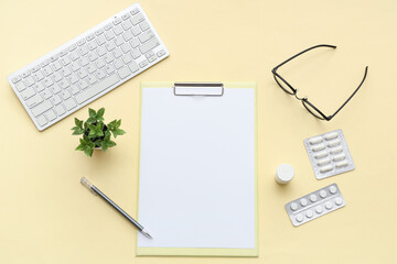 Poster - Blank clipboard with pills, eyeglasses and computer keyboard on yellow background. World Health Day