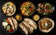 © Muhammad - Assorted Asian & Indian Dishes on Dark Table